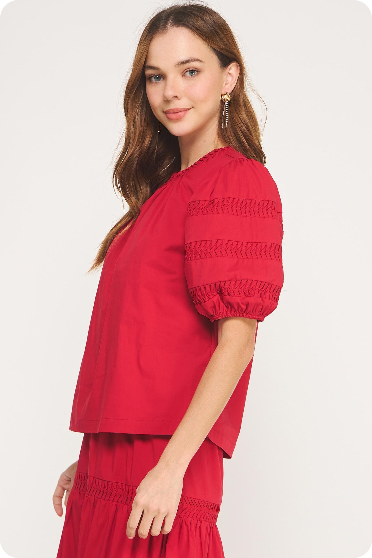 Venice Reverse Pintuck Puff Sleeve Top in light neutral fabric with gathered bodice and puffed sleeves.