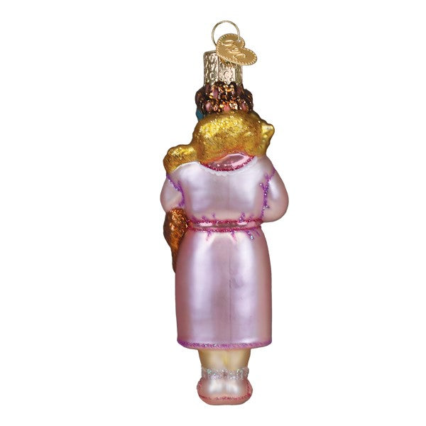 Back view of a glass Cat Lady ornament wearing a pink robe and holding several cats.