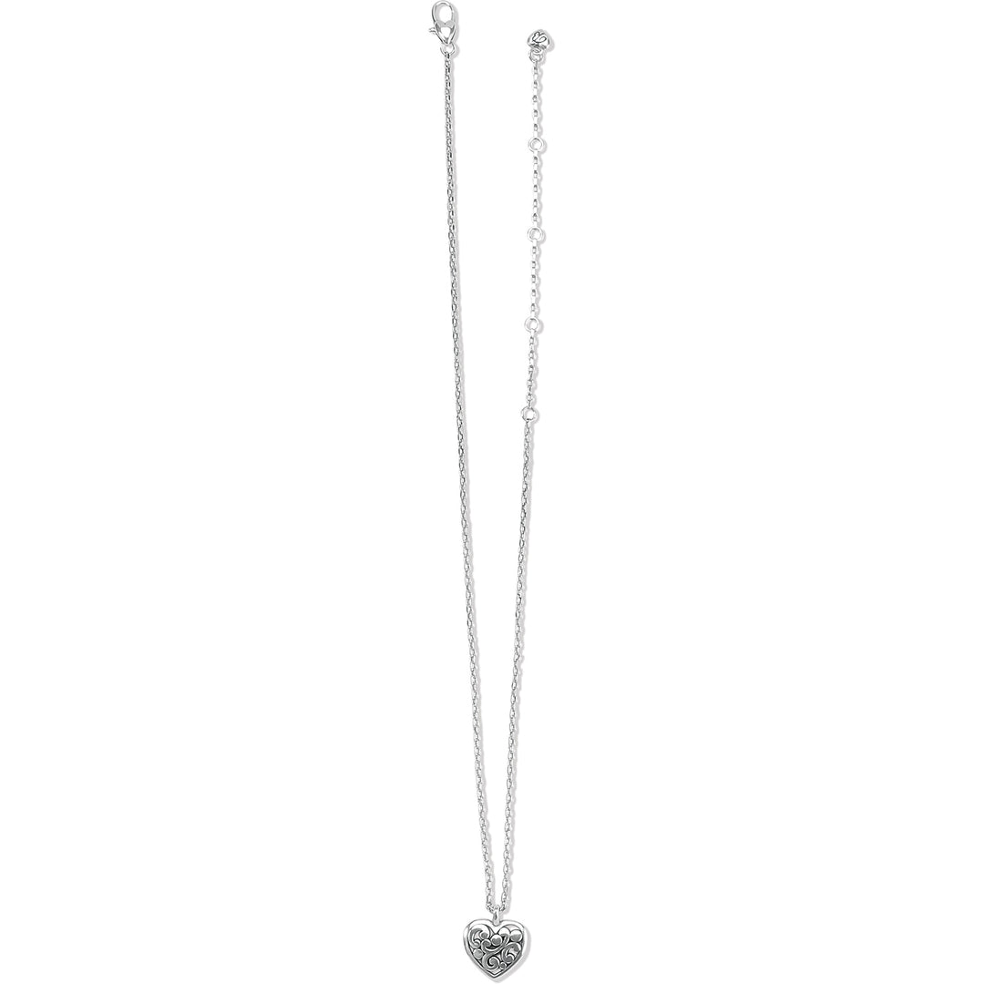 Silver plated Contempo Heart Petite Necklace with an intricate scrollwork heart pendant.