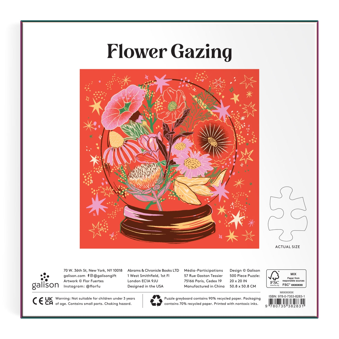 Flower Gazing foil puzzle box showing a crystal ball with flowers surrounded by stars and sparkles.