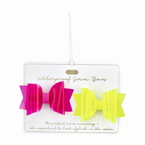 Yellow vinyl bow with pink accents on a white background