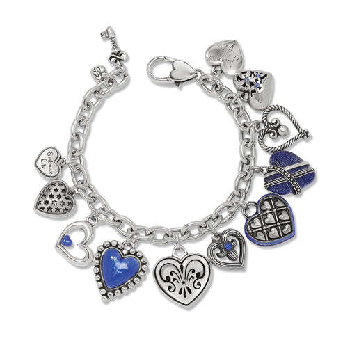Silver-plated One Heart Link Charm Bracelet with blue enamel crystals on a lobster claw closure