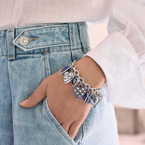 Silver-plated One Heart Link Charm Bracelet with blue enamel crystals on an 8-inch chain.