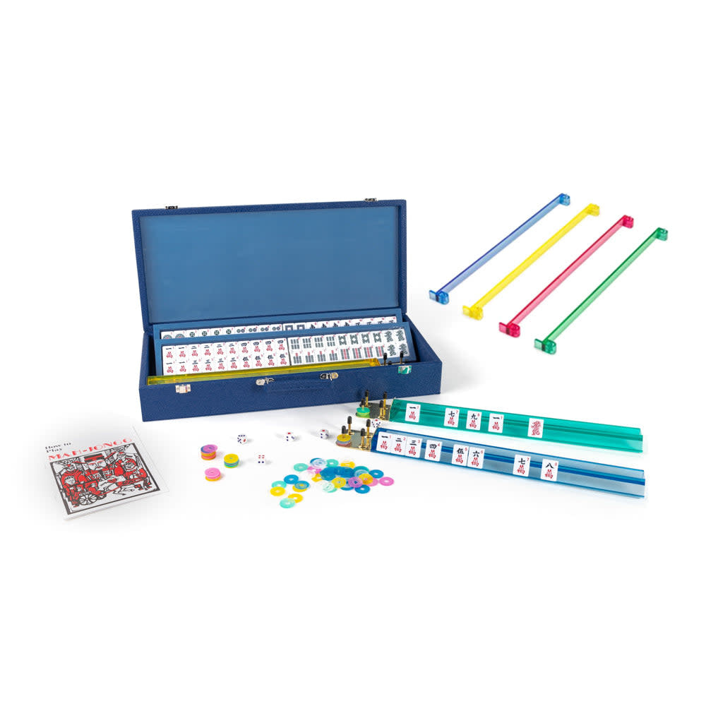 Onyx Mahjong set in blue Croc vegan leather case with polished stingray exterior and microfiber lining.