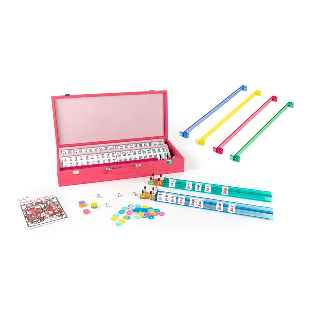 Onyx Mahjong set in pink Croc vegan leather case with polished stingray exterior and microfiber lining.