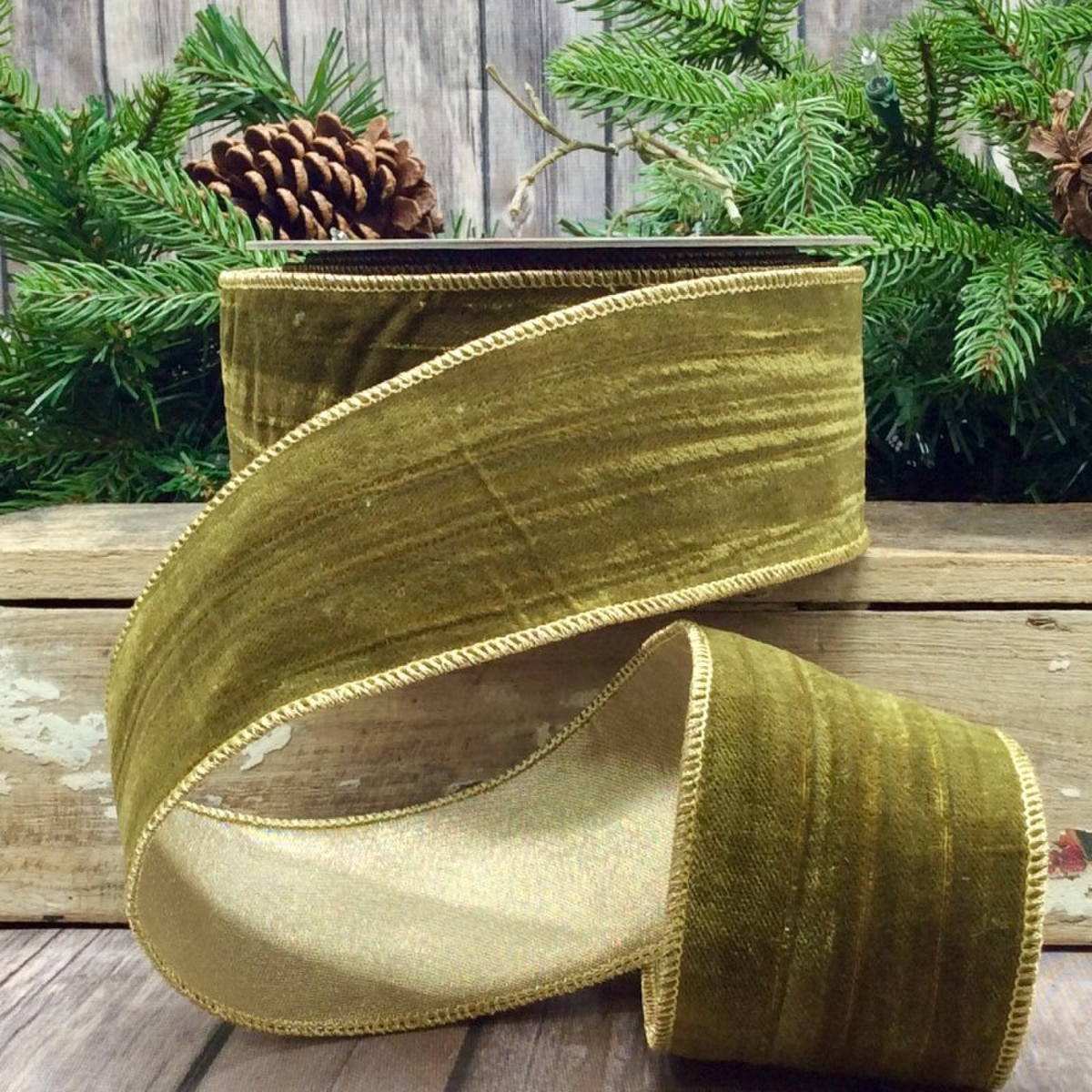 2.5 inch moss green velvet ribbon with a vintage chic gold back and wired edges.