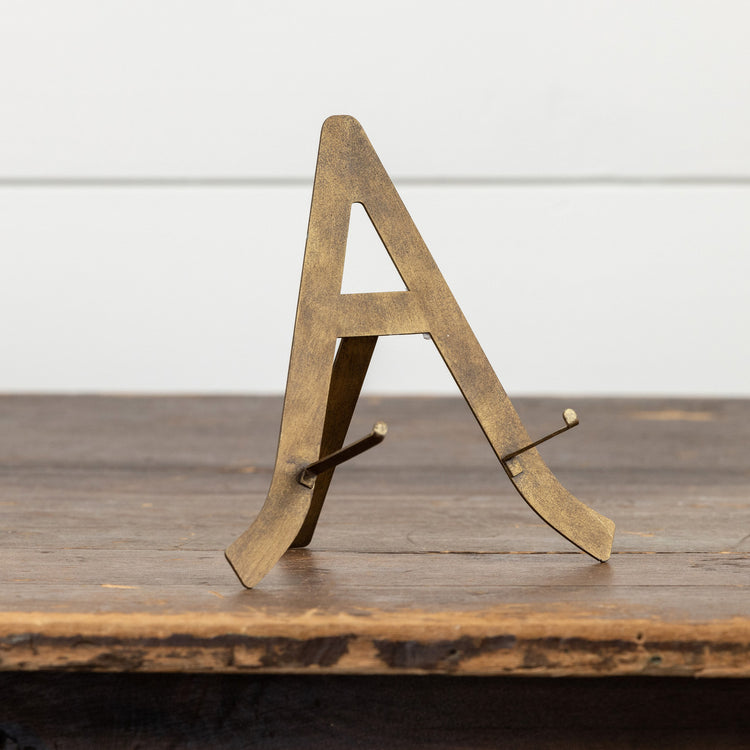Bronze metal plate stand with dimensions L:6.5in W:2.5in H:7.25in