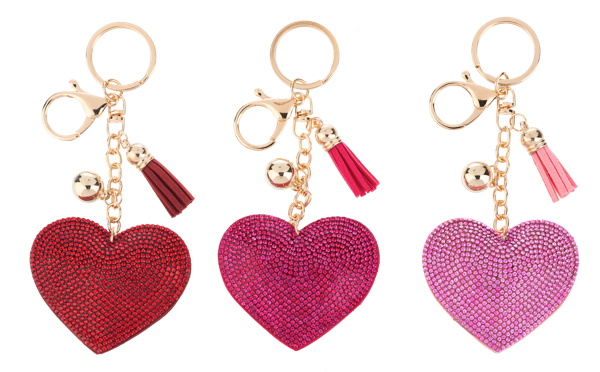 Sparkly heart-shaped metal keyring with a dangling charm