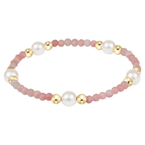 Pearl gemstone bracelet with a delicate chain link design.