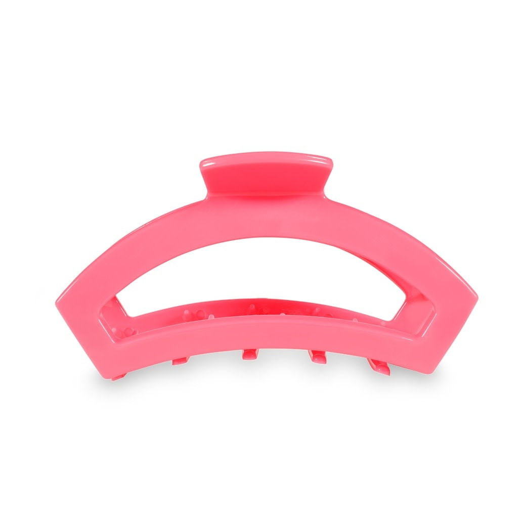 Open hair clip in Aruba blue with bendable teeth designed for thick to medium-thick hair.