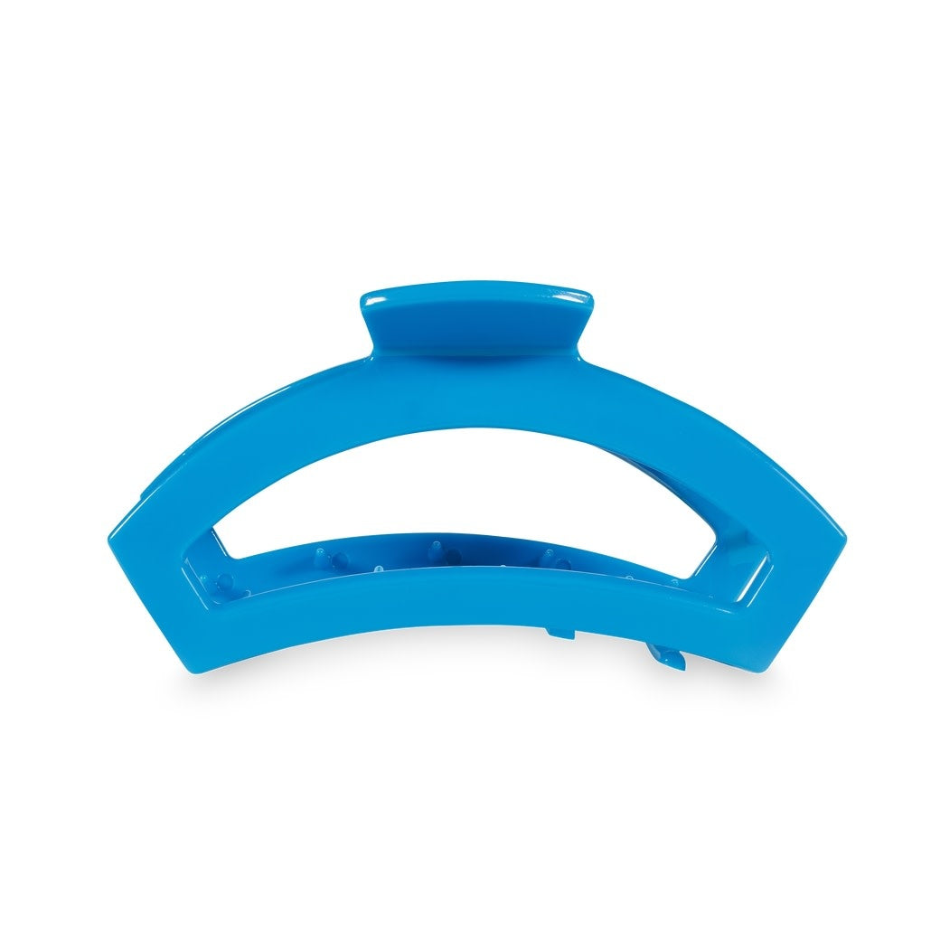 Medium open-style hair clip with bendable teeth in Bora Bora color