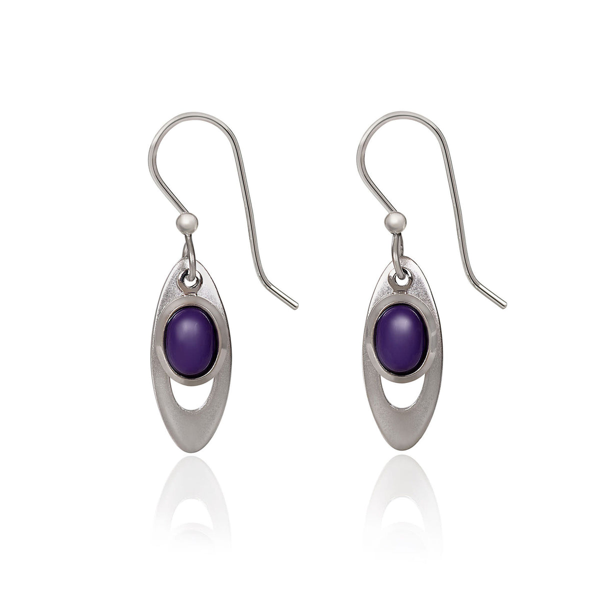 Open long oval earrings featuring a central cabochon stone with textured brass metalwork and glass bead accents.