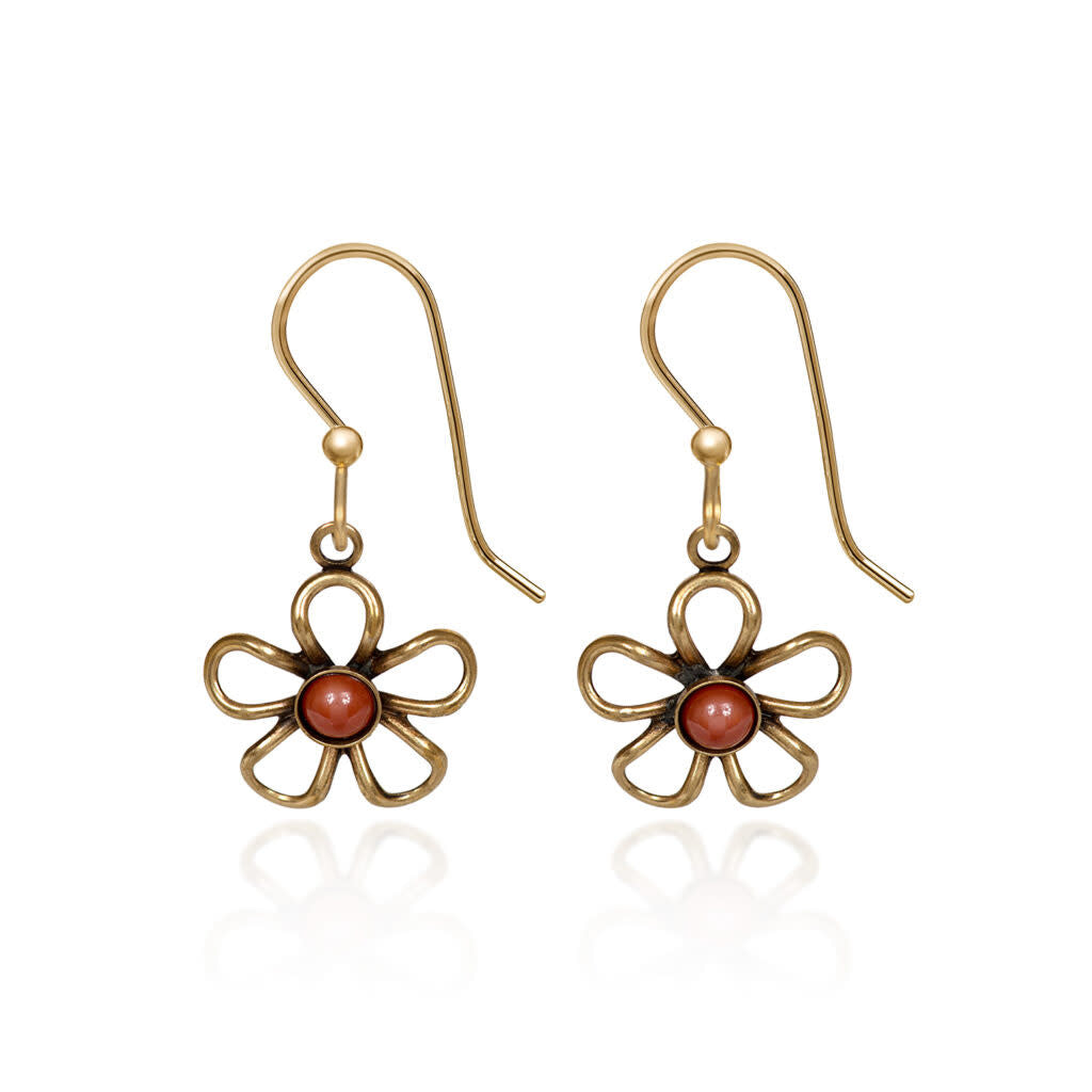 Open wirey flower earrings with cabochon stones in raw brass featuring natural textures and glass beads.