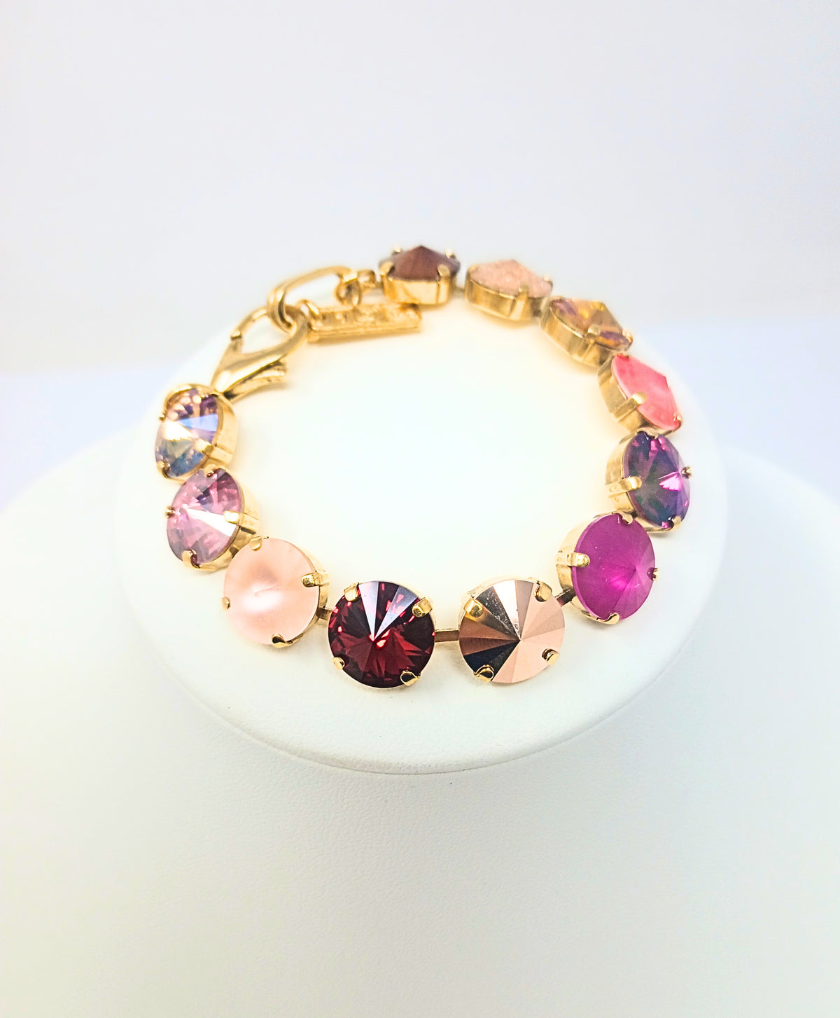 Croatia Bracelet featuring multi-colored round crystals in a gold-tone brass setting.