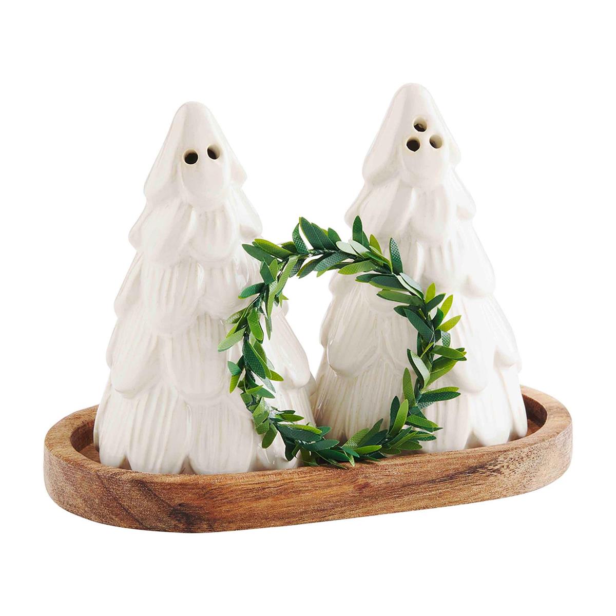 White stoneware salt and pepper shaker set with tree-shaped silhouettes.