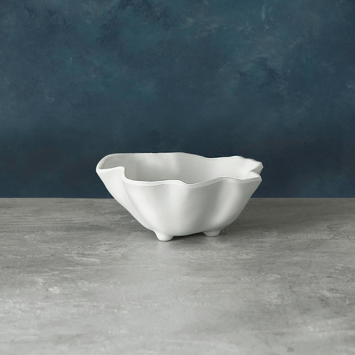 Small white matte melamine bowl with a round shape.