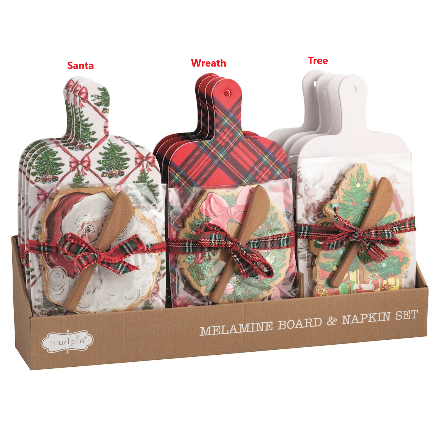 Three styles of Christmas melamine board sets with napkins and wooden spreaders in a display box.