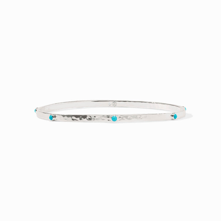 Hammered silver Crescent Stone Bangle featuring small, round turquoise stones set along the band.