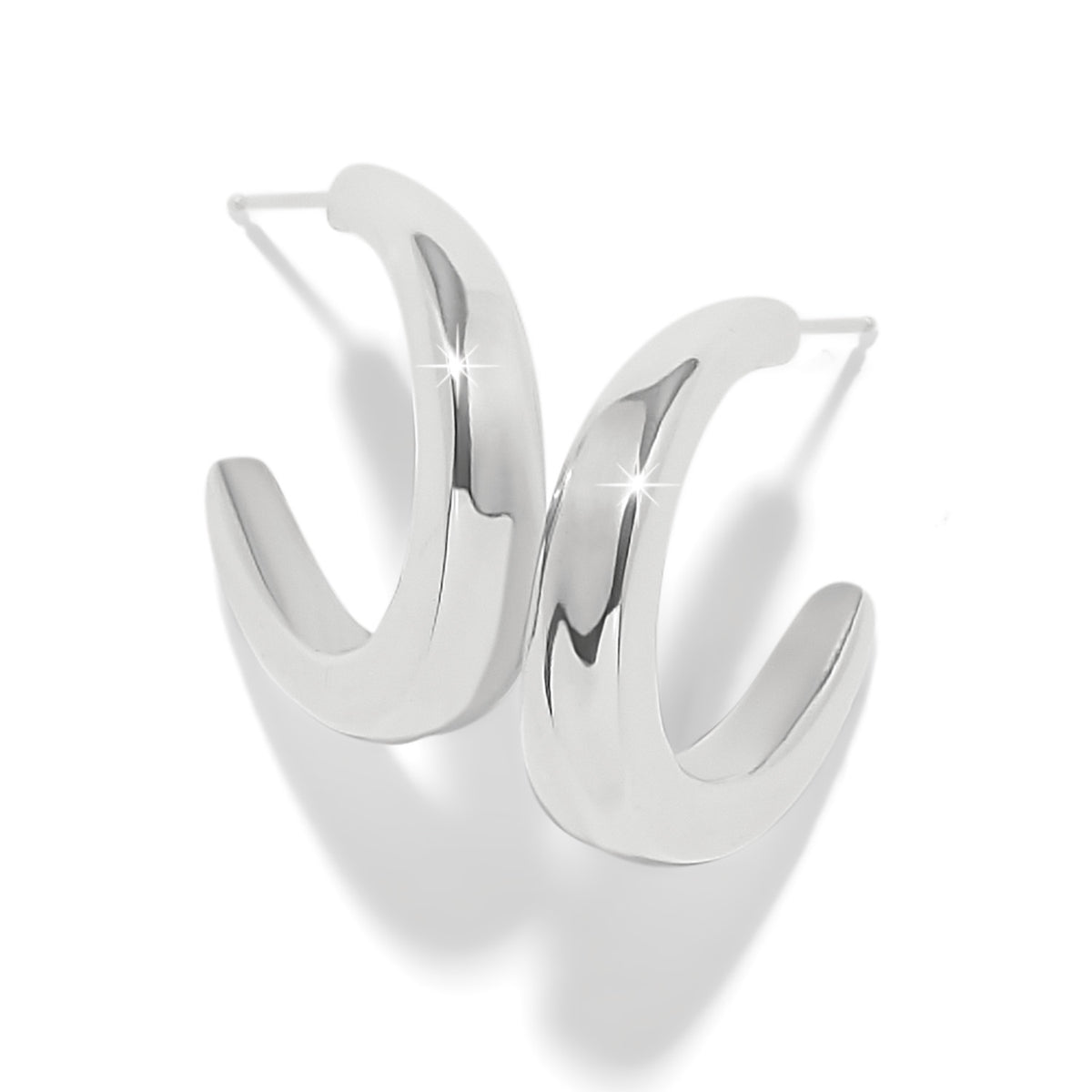 Silver plated post earrings with flat disc backs featuring a quarter-inch width.