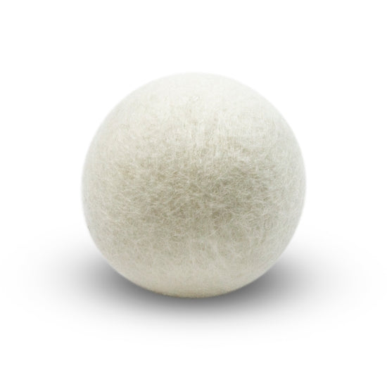 Single white eco dryer ball with a smooth spherical shape.