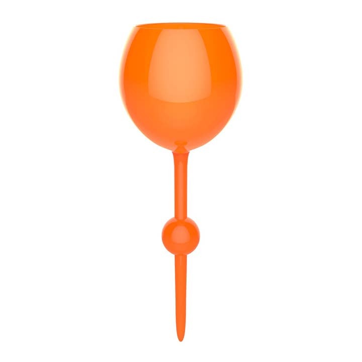 Orange sunrise-patterned beach glass tumbler with a wide cylindrical shape.