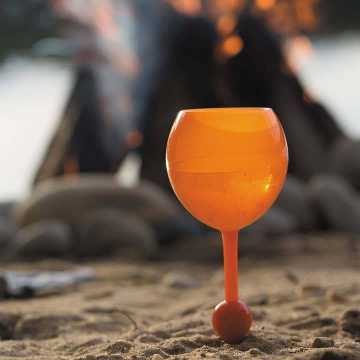 Orange sunrise beach glass tumbler with a gradient color from deep orange to yellow.