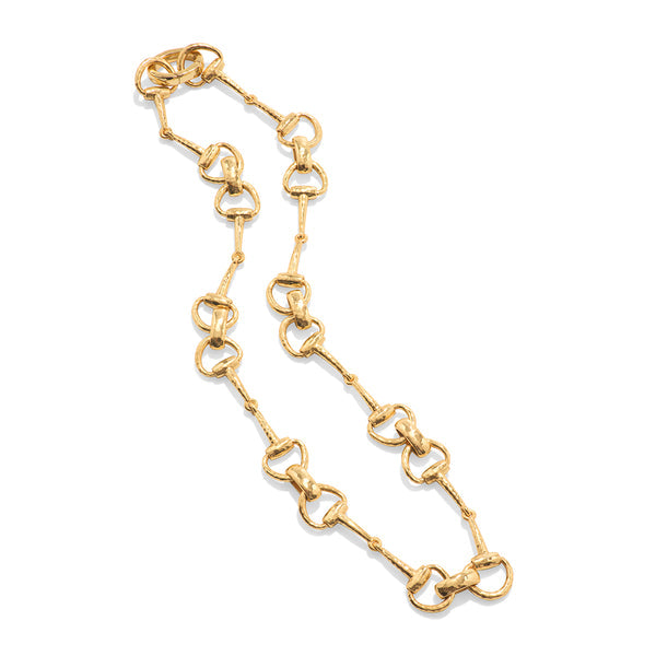 Gold chain necklace with an equestrian snaffle bit pendant