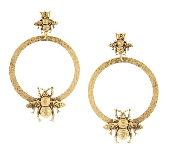 Georgia earrings featuring a delicate gold-plated brass silhouette with hand-set stones.