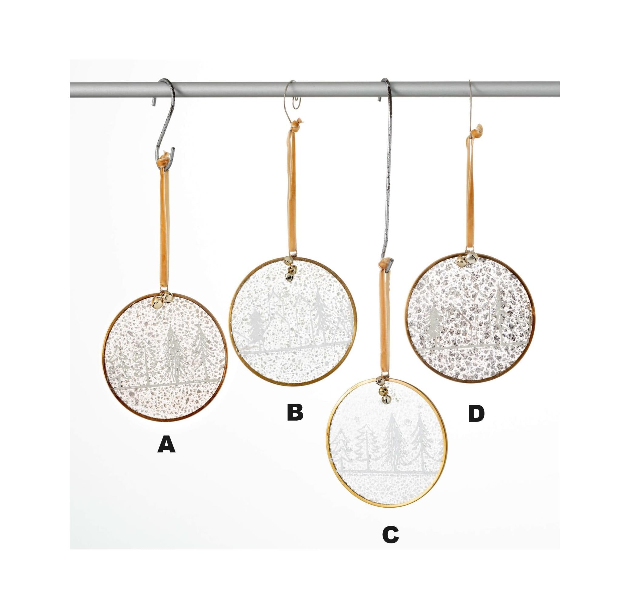 Glass Christmas tree ornament with white Scandinavian hygge design hanging from a gold ribbon.