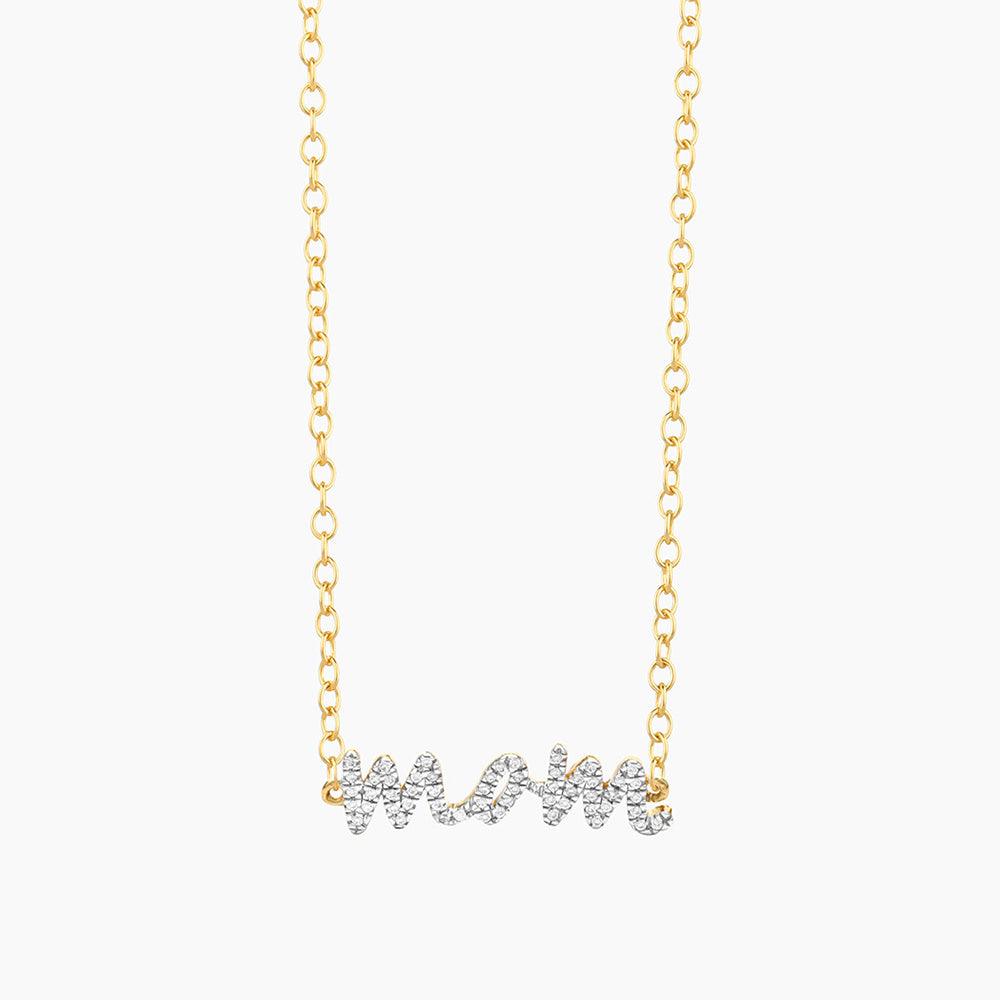 Gold chain necklace with a diamond-encrusted 'mom' pendant in a rockstar-style script.