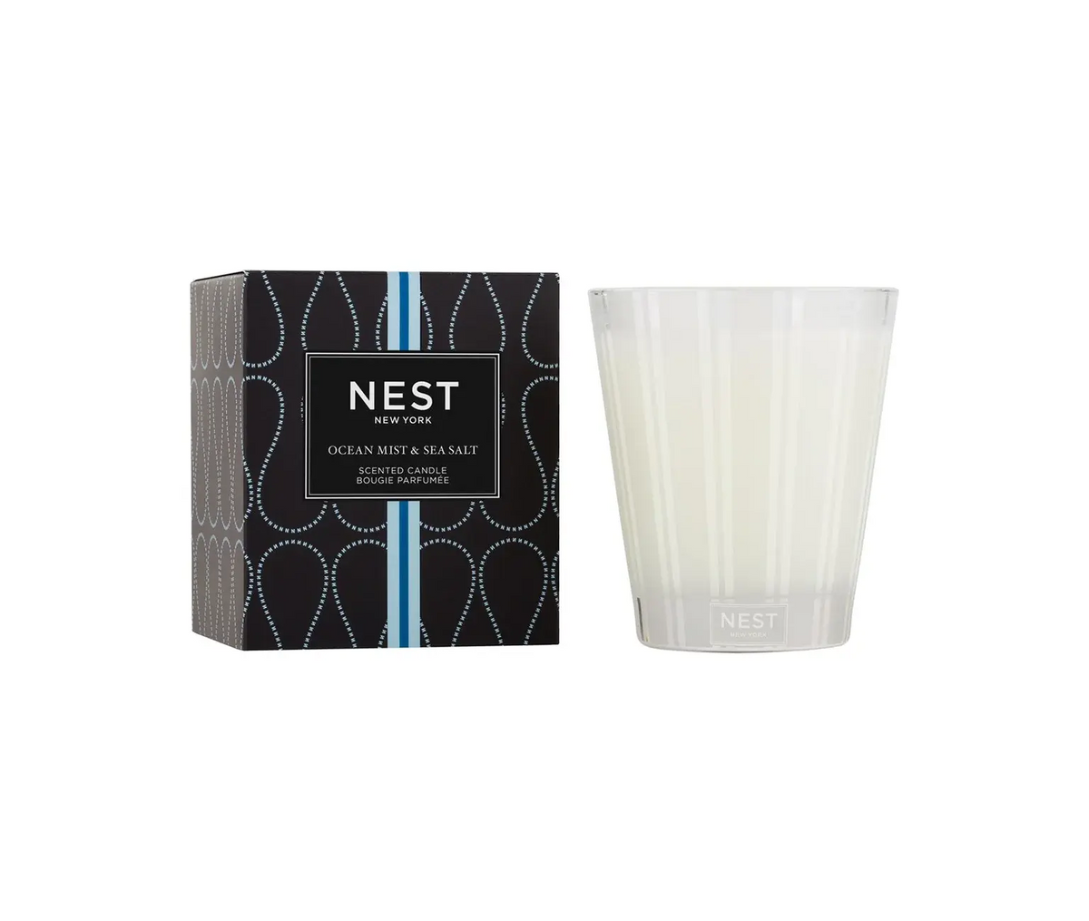 Nest Classic Candle in a clear glass jar with an off-white wax pillar.