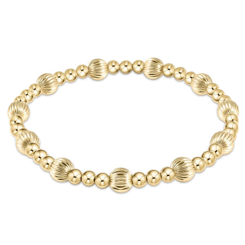 Gold-filled Dignity Sincerity bracelet featuring a mix of 4mm and 6mm beads with an elastic stretch design.