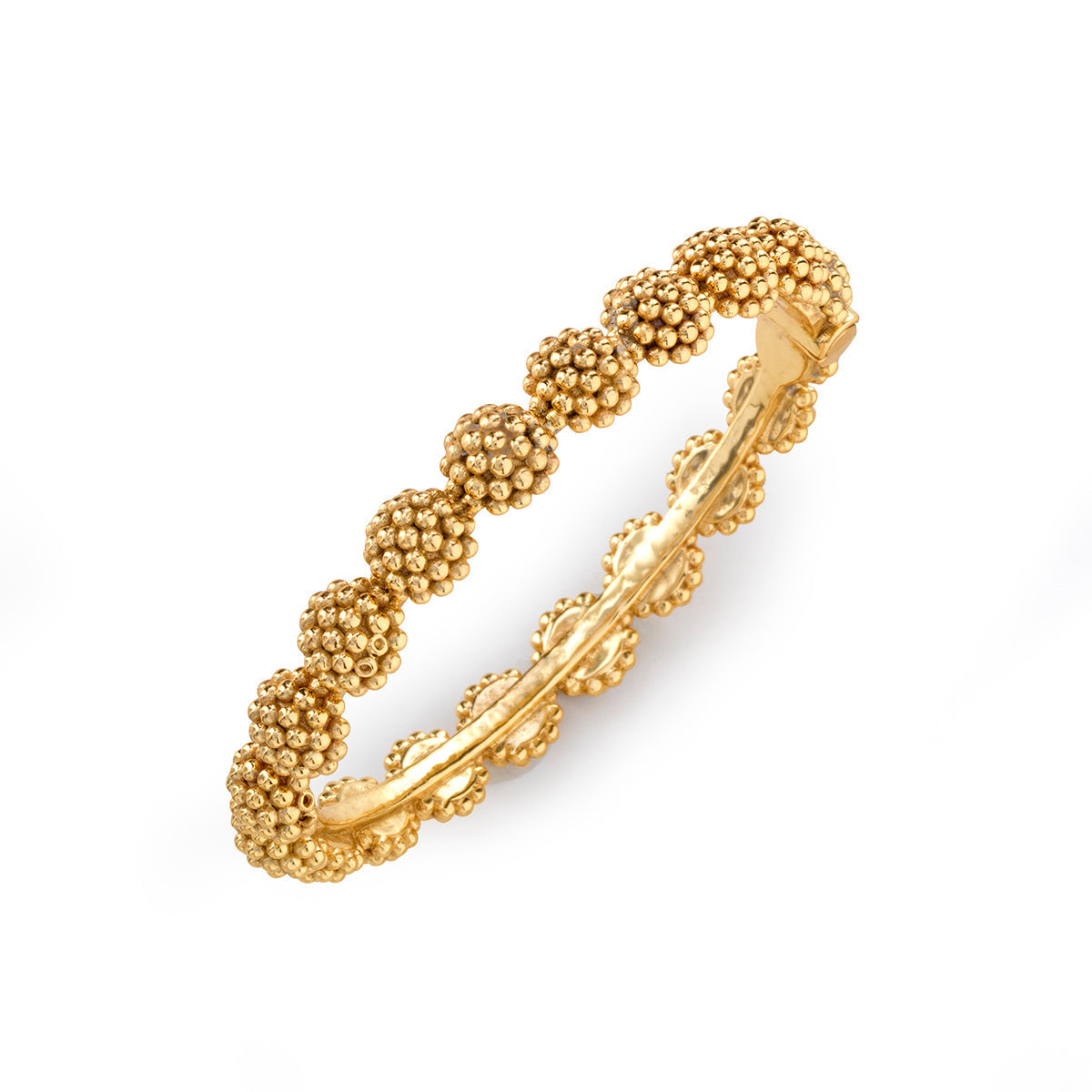 Gold hinged bangle bracelet with a berry-colored stone accent.