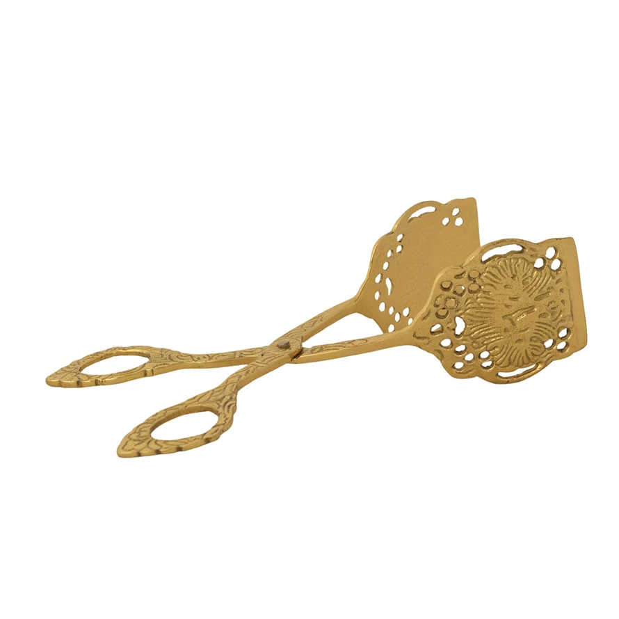 Embossed brass tongs with a textured surface and curved handles.