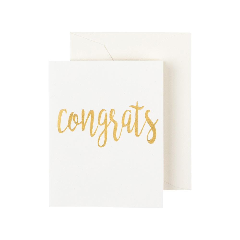 Four gold foil enclosure cards with script text inside matching envelopes.