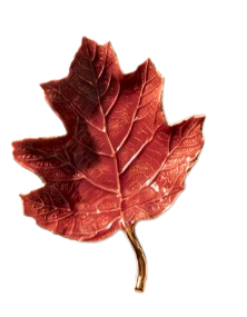 Red leaf-shaped tray with glossy enamel finish, textured veins, and a gold metallic stem.