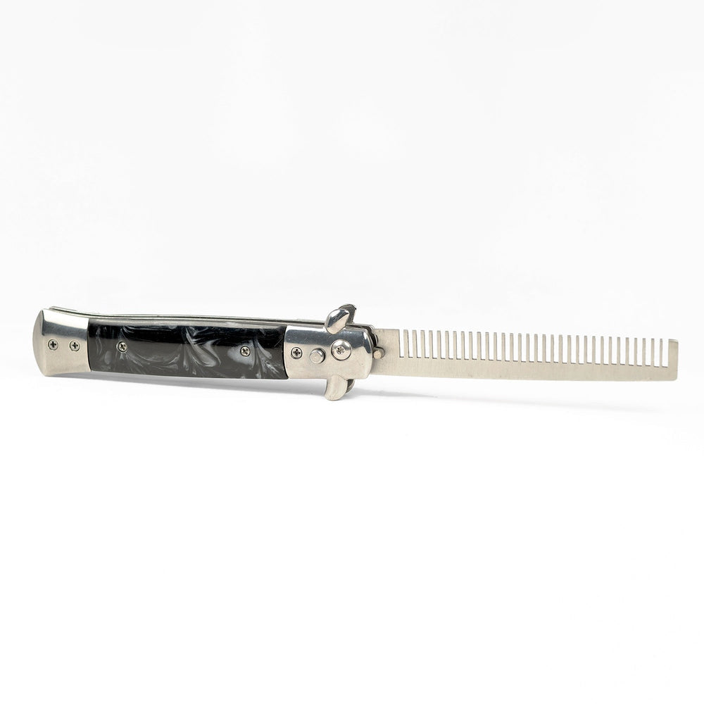 Black switch blade beard comb made of stainless steel and acrylic with a sleek silhouette.