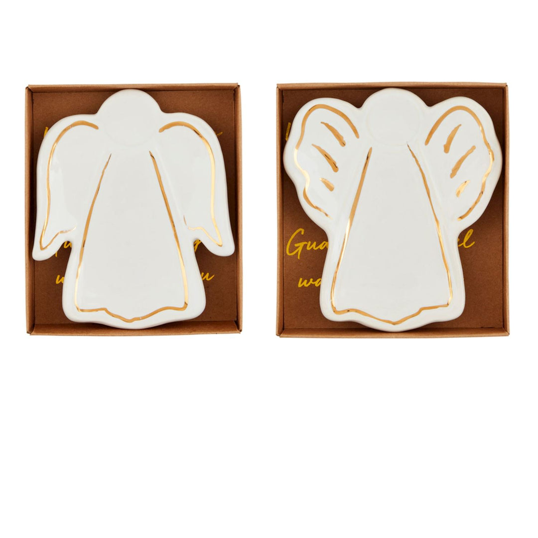 Two white stoneware angel tidbit dishes with gold electroplate rims in brown gift boxes.