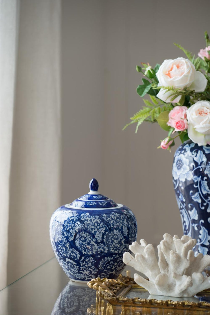 Round porcelain ginger jar in blue and white with a matching lid