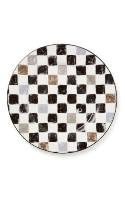 Round ceramic platter featuring a hand-painted black and white checkered pattern.