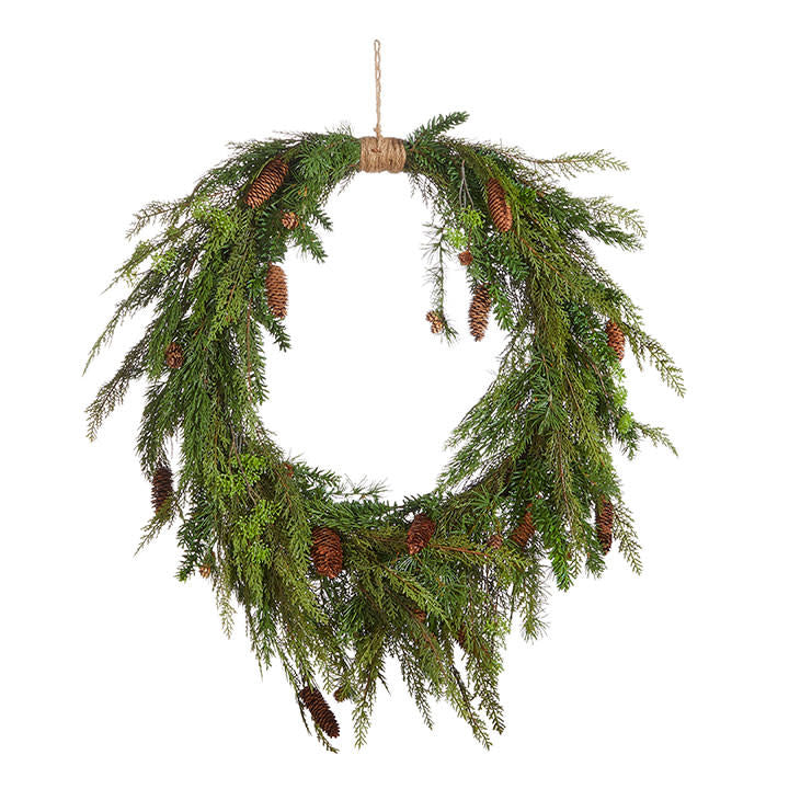 36-inch oval wreath made of green cedar branches and pinecones, tied with twine at the top.
