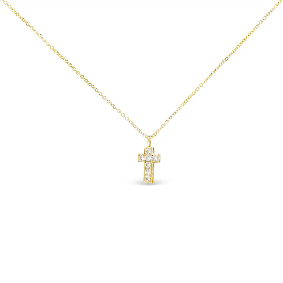 Gold CZ small framed cross necklace with shimmering stones on a delicate gold chain.