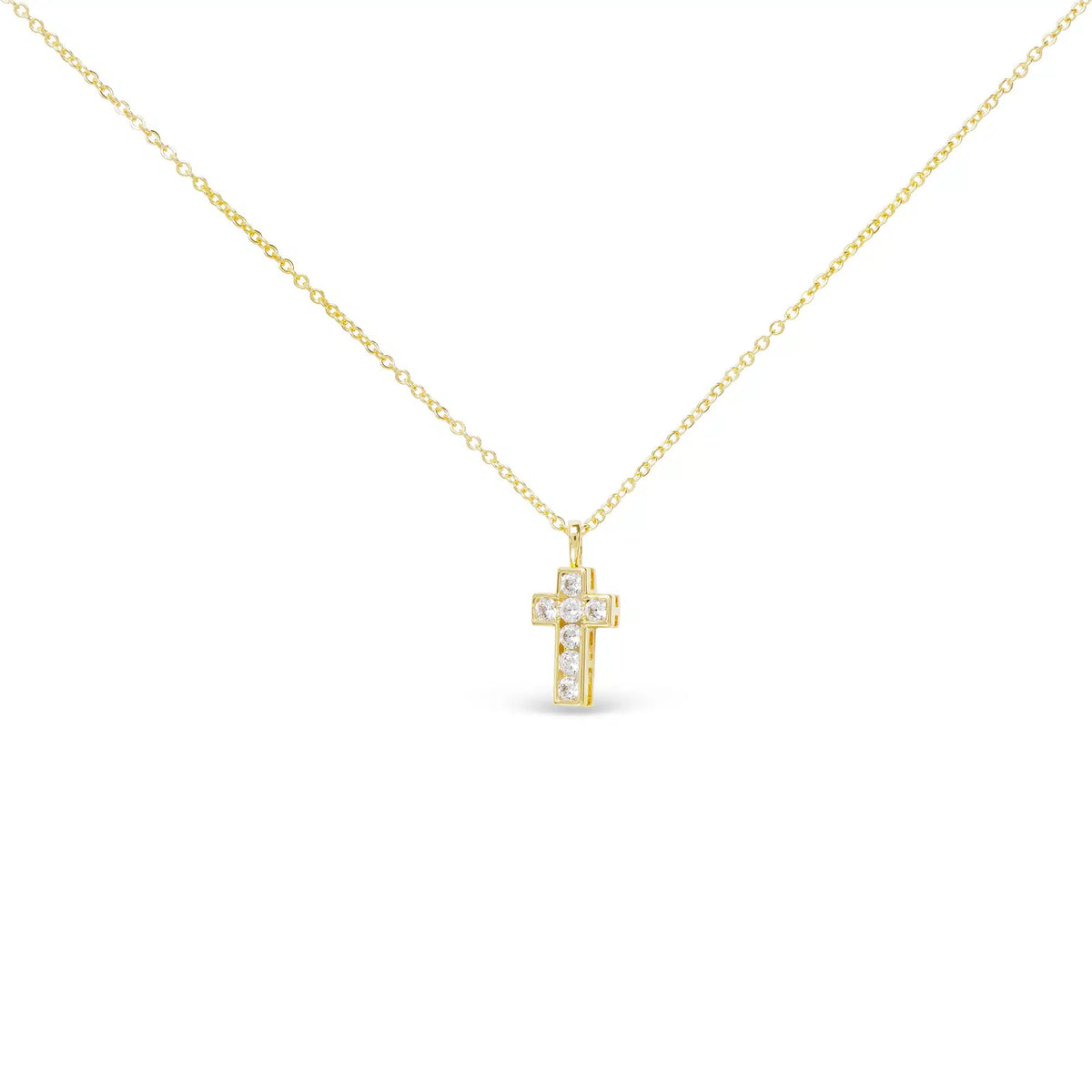 Gold CZ small framed cross necklace with shimmering stones on a delicate gold chain.
