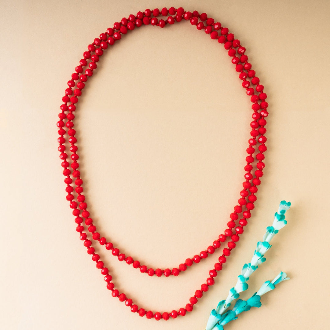 60-inch long necklace featuring clear crystal beads with no clasp