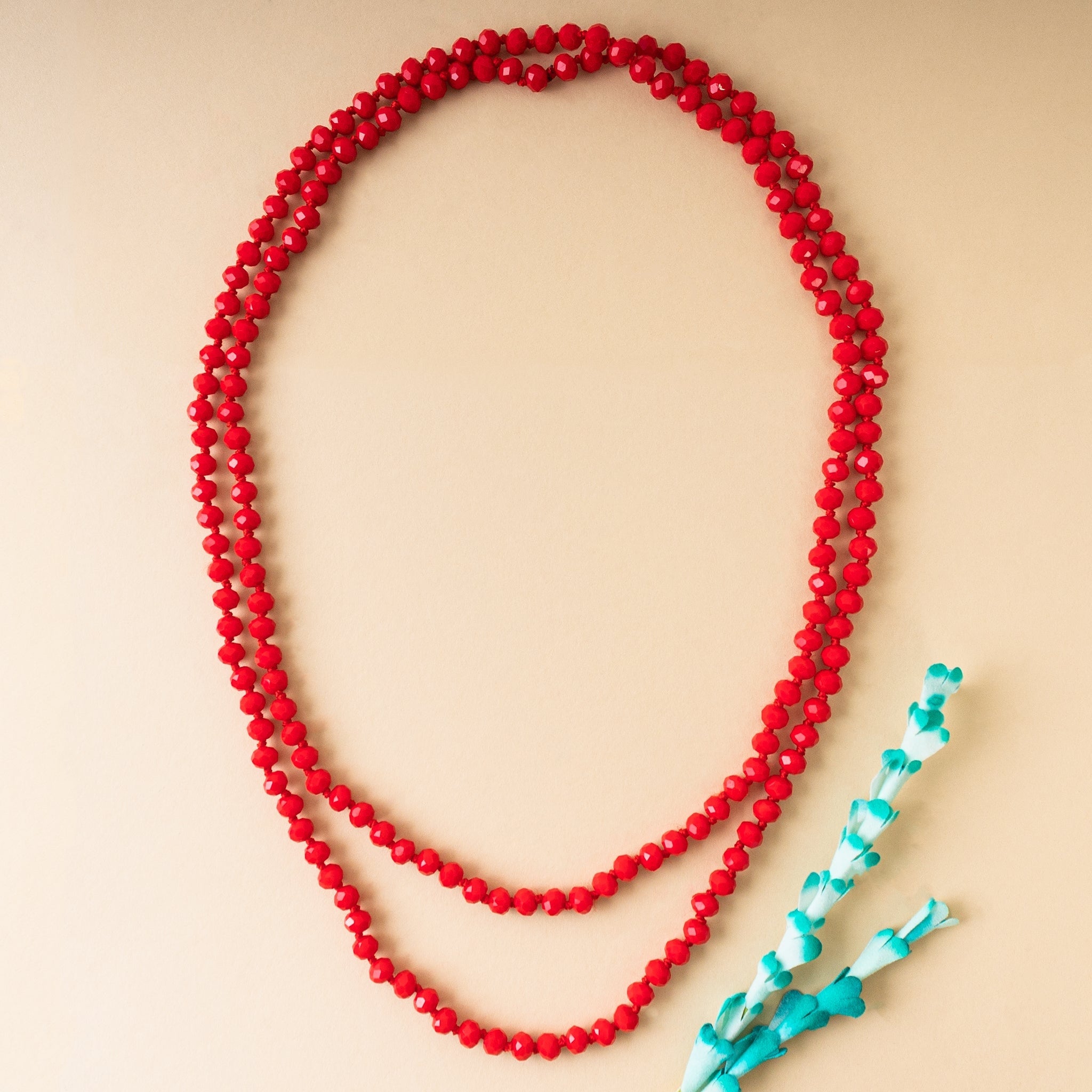 60-inch long necklace featuring clear crystal beads with no clasp