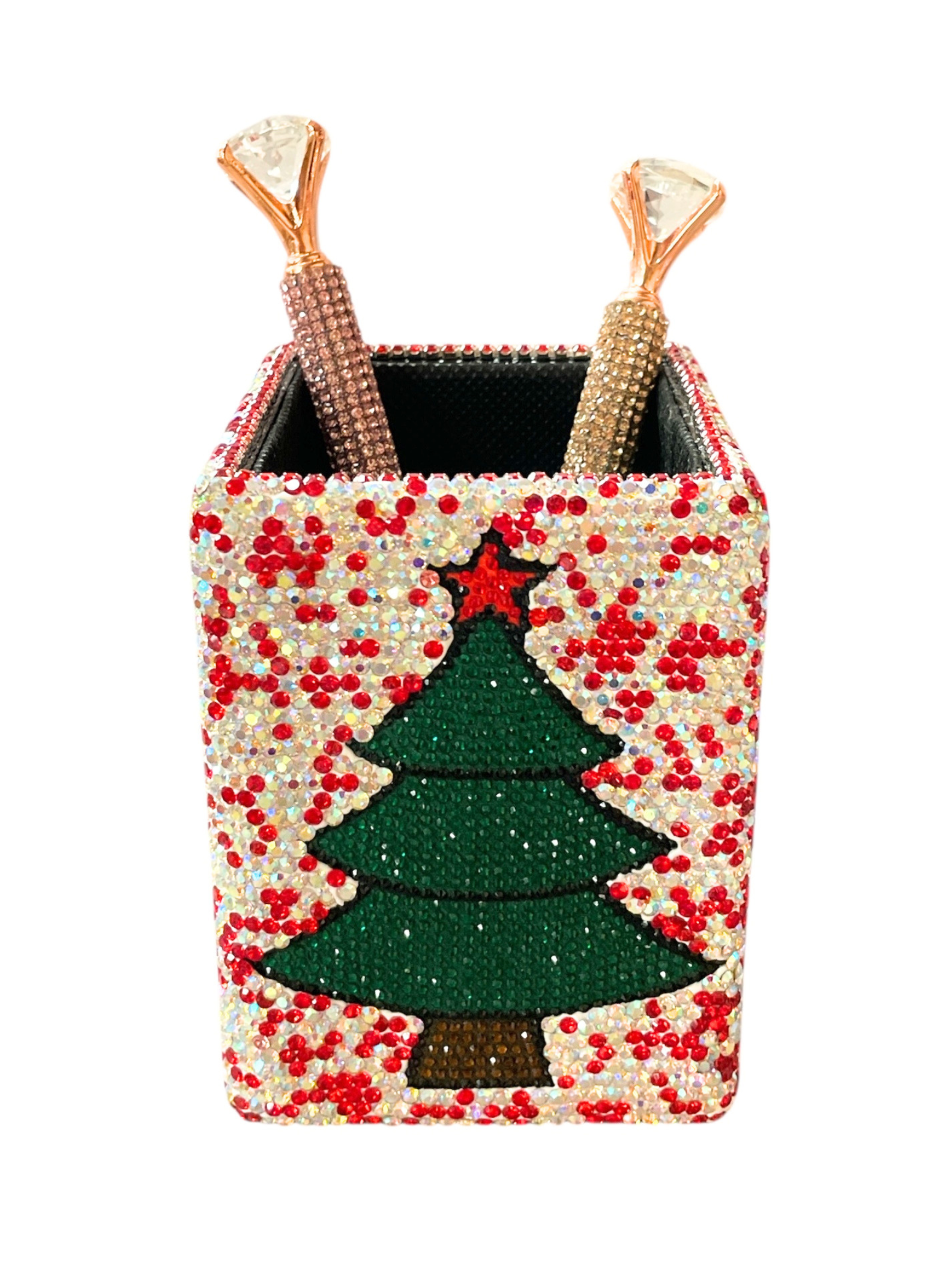 Christmas rhinestone pen holder with a green tree design, holding two diamond-topped pens.