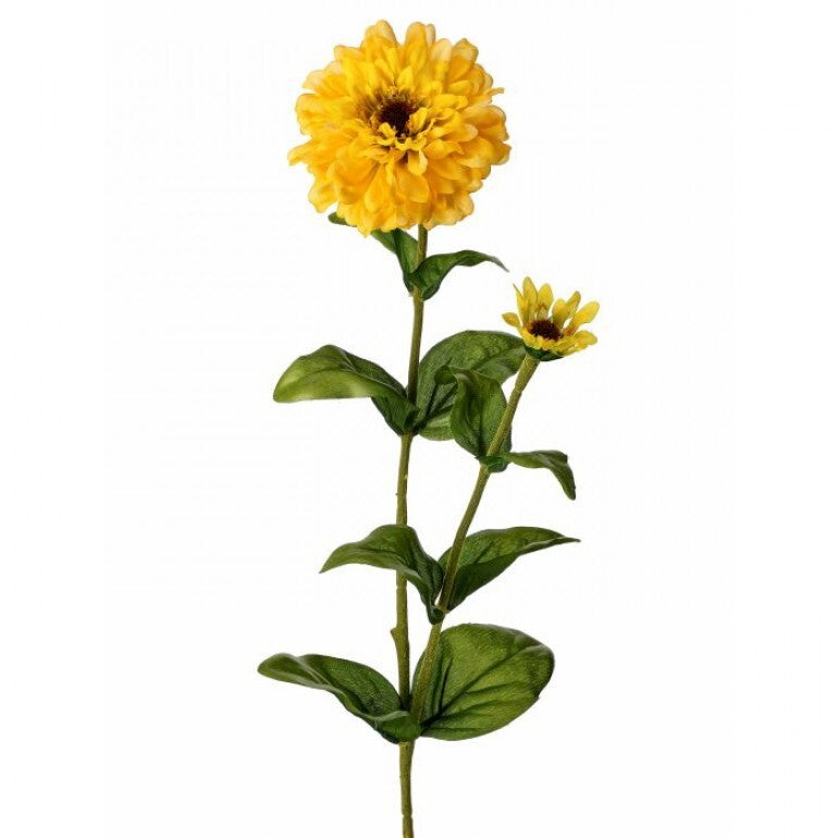 A tall artificial yellow zinnia flower with a smaller bud on a stem with green leaves.