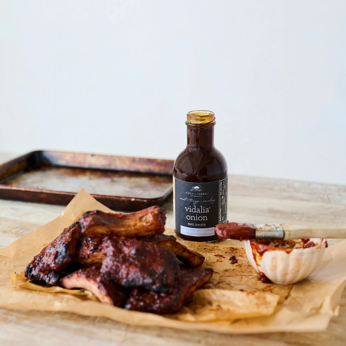 Bottle of Vidalia Onion BBQ sauce with a label showing grilled meat.
