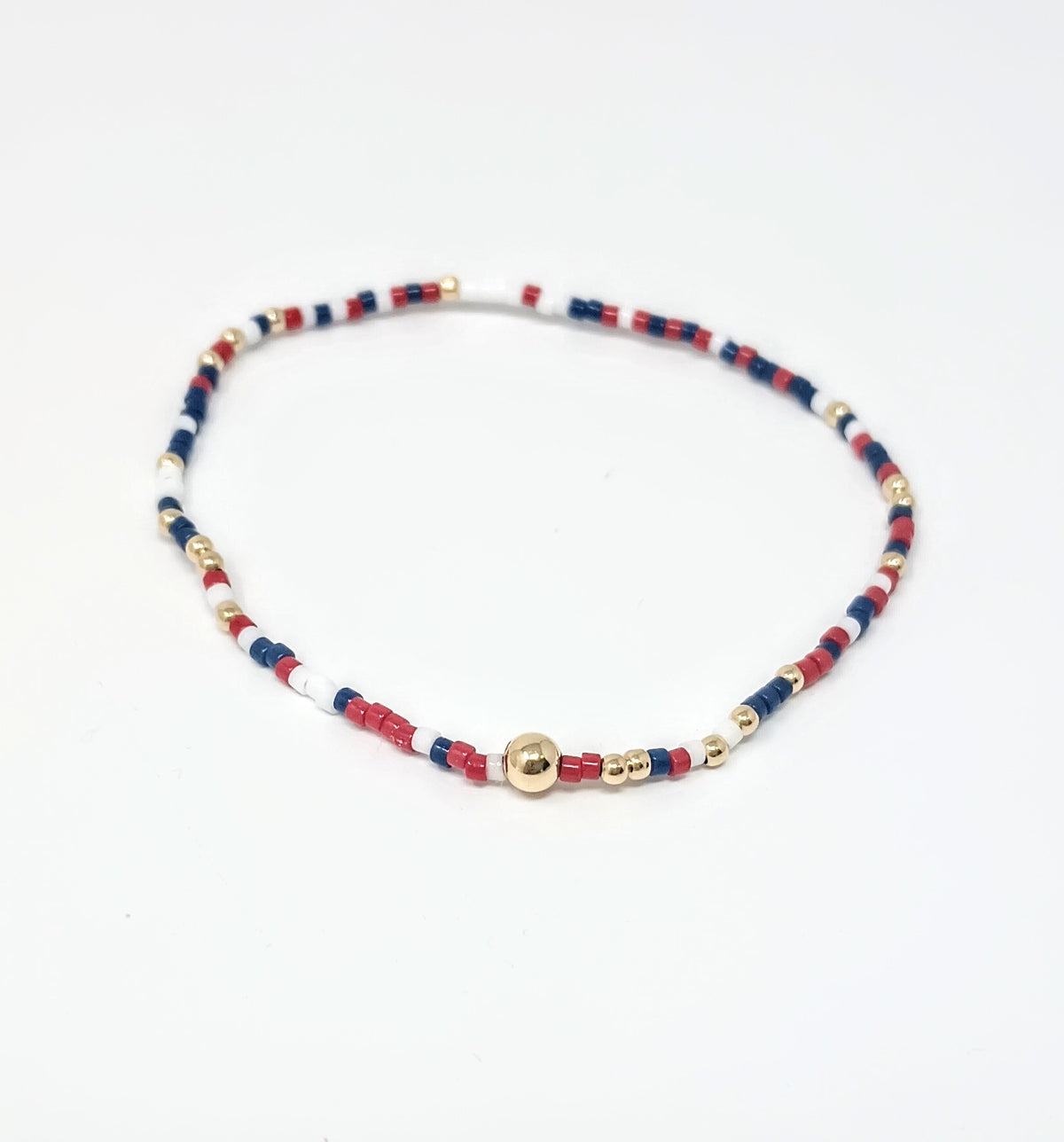 Hand-beaded Hope Unwritten bracelet with mixed seed beads in various colors on high-performance elastic.