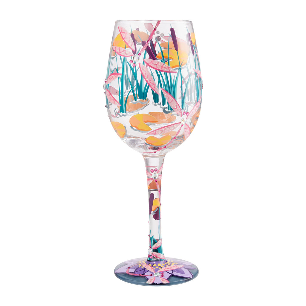 Blown glass wine glass with hand-painted designs, glitter accents, and a cocktail recipe printed on the base.
